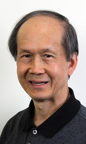 a close-up of a man smiling